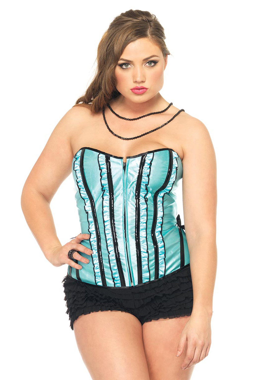 A woman modeling a strapless corset-style top with a turquoise and black striped pattern, paired with black ruffled shorts, against a plain white background.