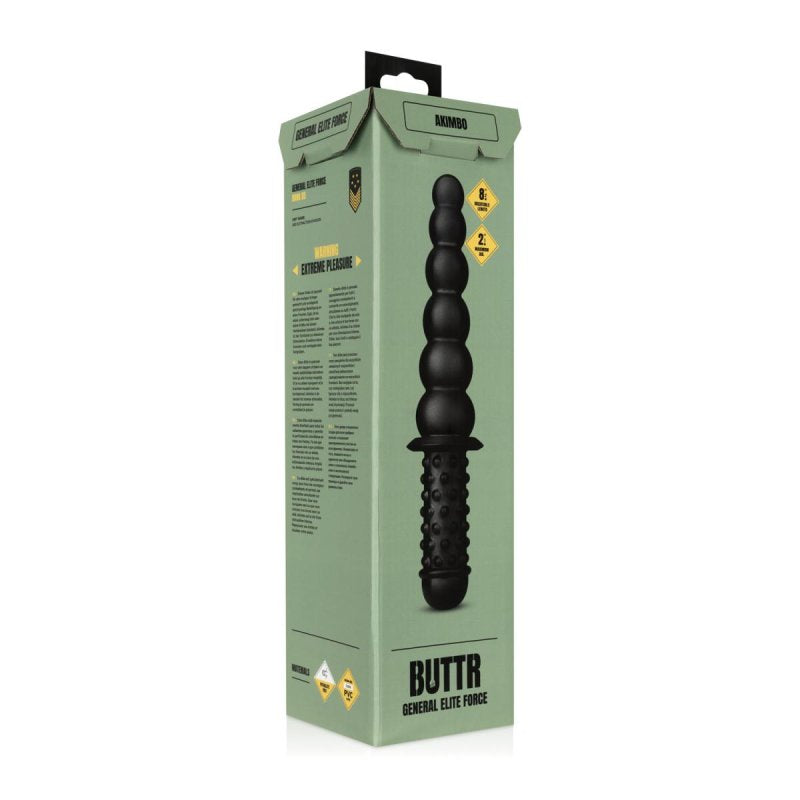 Green packaging of a black toy with 'Buttr' branding on a white background