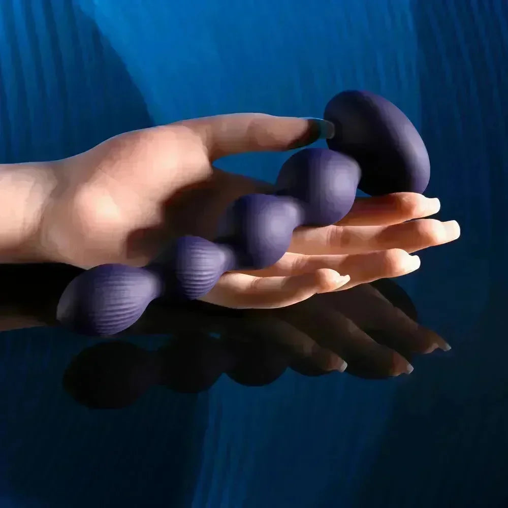 Evolved PLEASURE ORBIT - Navy 17.8 cm USB Rechargeable Twirling & Vibrating Anal Beads with Remote - Take A Peek