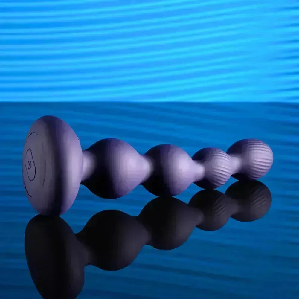 Evolved PLEASURE ORBIT - Navy 17.8 cm USB Rechargeable Twirling & Vibrating Anal Beads with Remote - Take A Peek