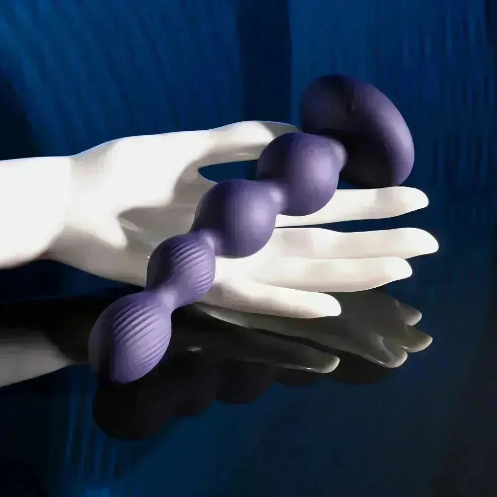 Evolved PLEASURE ORBIT - Navy 17.8 cm USB Rechargeable Twirling & Vibrating Anal Beads with Remote - Take A Peek