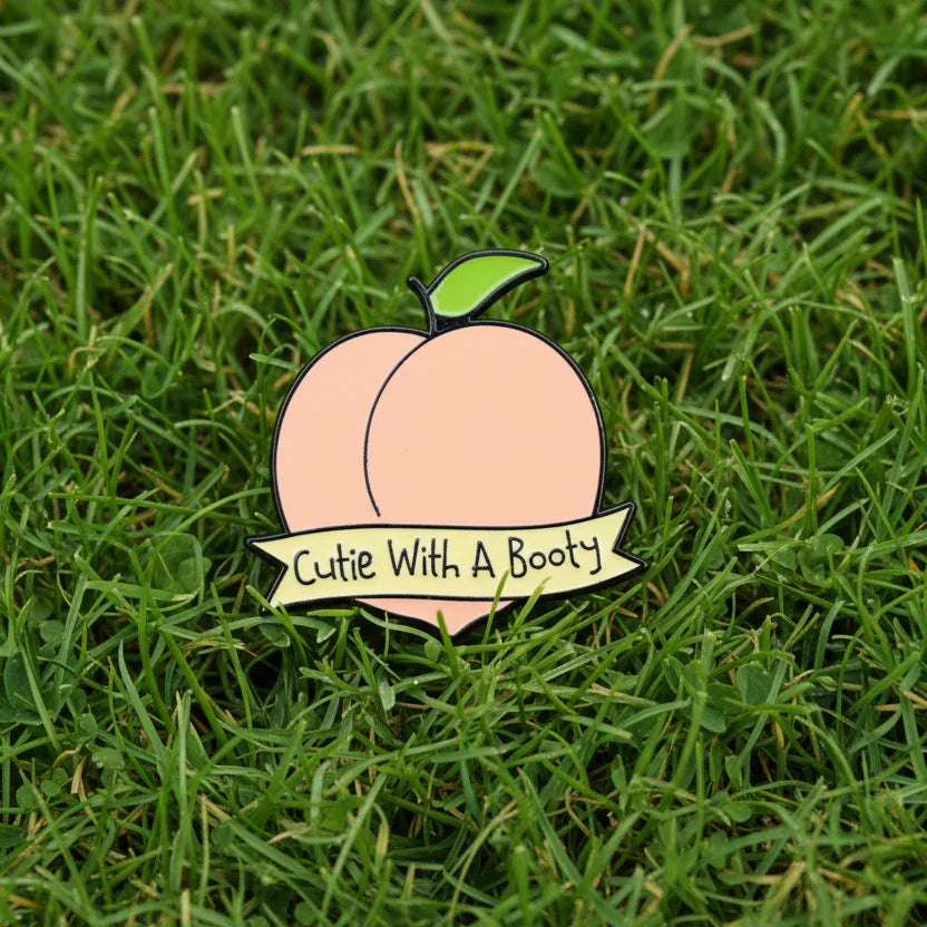 Cutie With A Booty Enamel Pin - Take A Peek